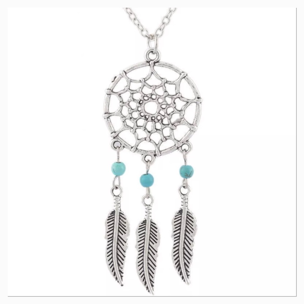 Silver and turquoise dream catcher necklace.